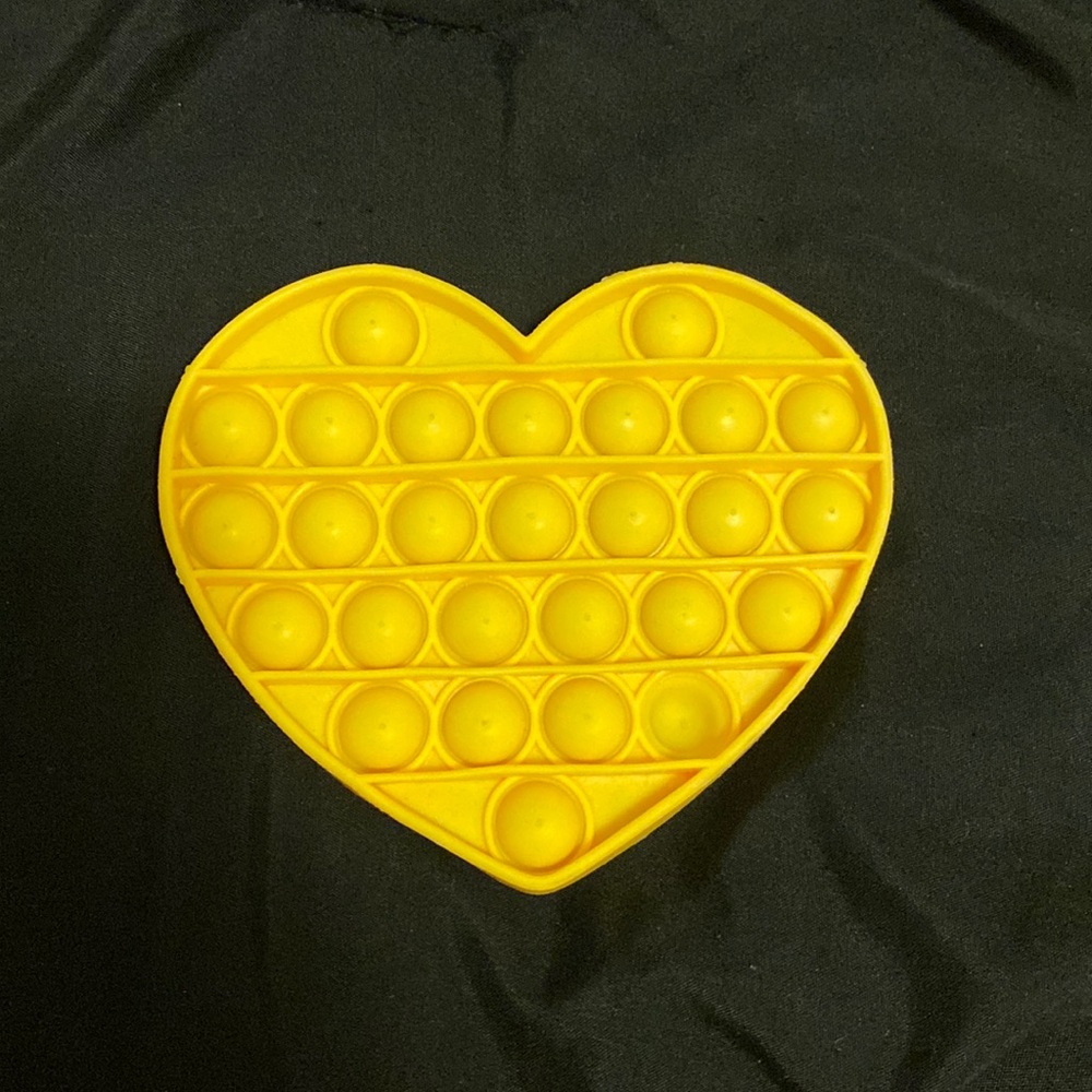 Yellow heart pop it